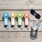Handheld mini fans — Flat Lay - Styled | Generated by Modelize