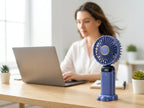 Portable handheld mini fan — Lifestyle - Workspace | Generated by Modelize