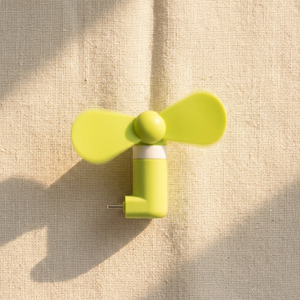 Portable mobile phone fan — Summer Essentials Flat Lay | Generated by Modelize
